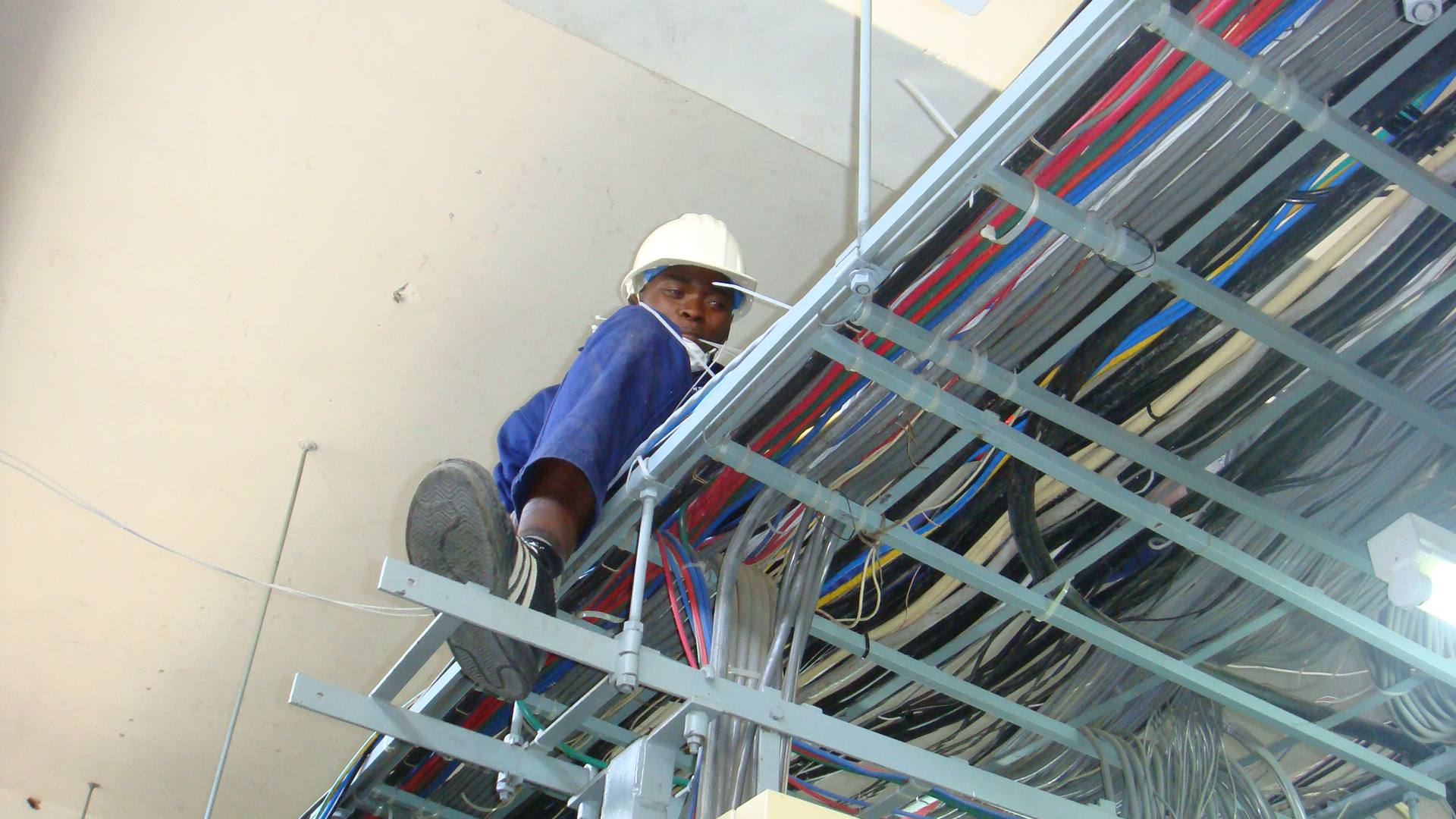 SEEC Engineer laying overhead power systems